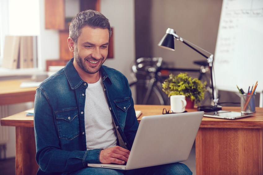 Flexible Training - Man on Laptop Outside