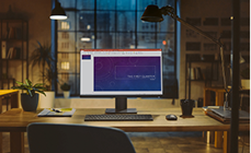 Computer screen displaying an AI and data presentation on an office desk Computer screen displaying an AI and data presentation on an office desk